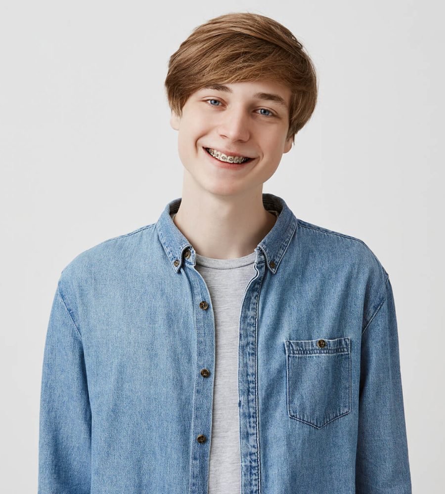 happy-young-european-man-with-fair-hair-and-blue-e-E7C8J8M.jpg