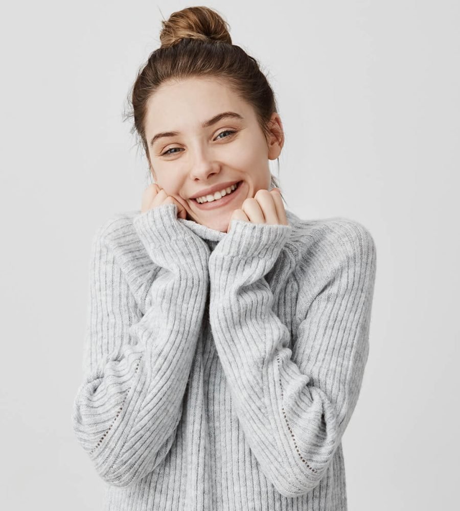 headshot-of-adorable-smiling-woman-wrapping-up-her-HNGC7QB.jpg